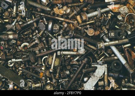 old dirty mix nuts and bolts used grunge with grease oil texture pattern for garage industry background Stock Photo