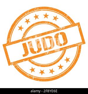 JUDO text written on orange round vintage rubber stamp. Stock Photo