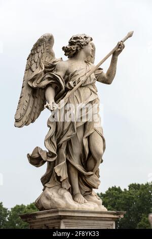 Marble statue of Angel with the Lance by Domenico Guidi from the Sant'Angelo Bridge in Rome, Italy Stock Photo