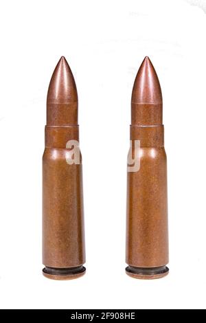 Military cartridges used in submachine guns. Live ammunition used in international conflicts. Isolated background. Stock Photo
