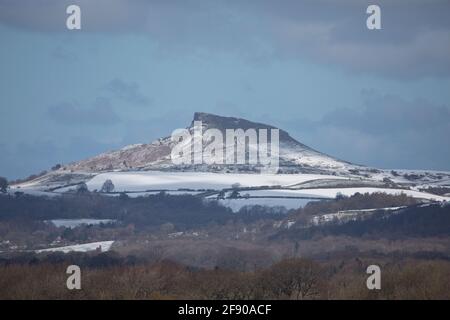 Roseberry Topping with a light covering of snow in April, North Yorkshire; England; United Kingdom Stock Photo