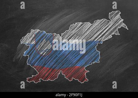 Outline map and flag of Slovenia Stock Photo - Alamy