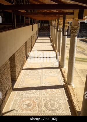 The colonnade and mosaic surrounding the Peristyle, Villa Romana del Casale Stock Photo