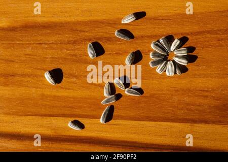 Close up of  Sunflower seeds on a wooden table Stock Photo