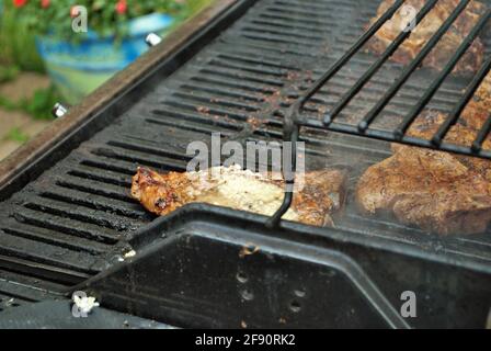 steak on the grill at a backyard cookout Stock Photo