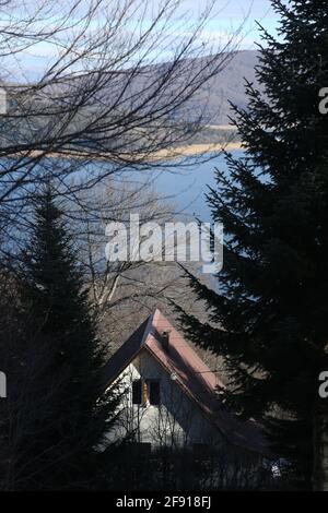 Lake house at Mavrovi Anovi Town in Mavrovo, Macedonia. Stock Photo