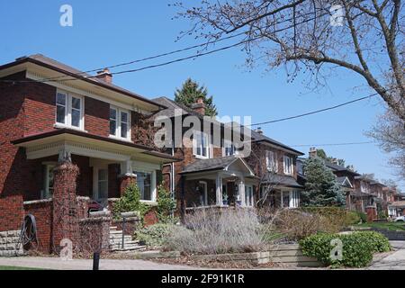 Residential street with traditional single family detached houses Stock Photo