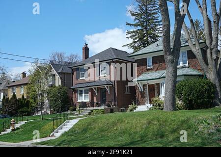 Residential street with traditional single family detached houses Stock Photo