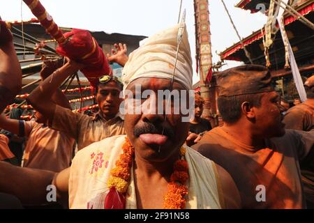 Kathmandu, NE, Nepal. 15th Apr, 2021. Buddha Krishna Shrestha, 48, pierces his tongue for the eighth time in his life, during the annual Jibro Chhedne Jatra (Tongue Piercing Festival) on the occasion of the New Year, at Bode, Thimi in Kathmandu, Nepal on April 15, 2021. Credit: Aryan Dhimal/ZUMA Wire/Alamy Live News Stock Photo