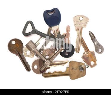 overhead of many different keys in oder on wooden background concept Stock Photo