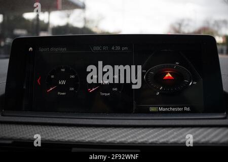 A 2020 BMW M2 Competition Digital Dashboard With Sports Display Brake Horse Power BHP Graphs And Directional Compass Stock Photo