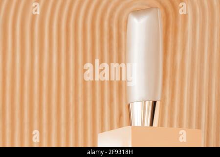 Foundation bottle mockup on geometric podium display, art deco modern natural background Stock Photo