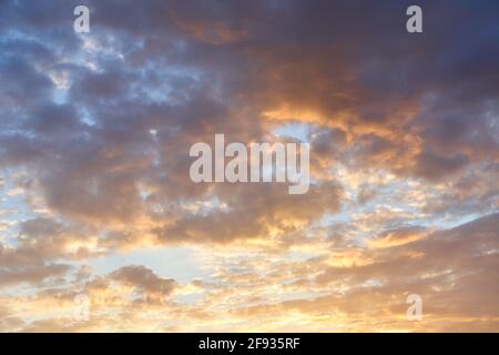 Dark orange sky evening with clouds at sunset Stock Photo