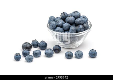Fresh blueberries in glass bowl isolated on white background. Stock Photo