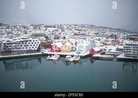 Aerial drone photo of Tromso in Northern Norway, highlighting the colourful boat sheds along the harbour. Image taken with DJI Mavic 2 Pro. Stock Photo