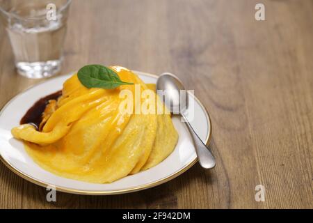 tornado omelette over fried rice Stock Photo