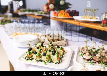 Catering service. Snacks for guests on the table. Stock Photo
