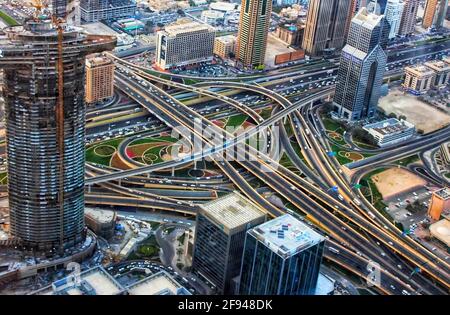 Building and crisscrossing road view from the top of the Burj Khalifa, Dubai Stock Photo