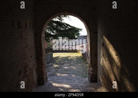 An archway of a medieval building in an Italian village (Marche, Italy, Europe) Stock Photo