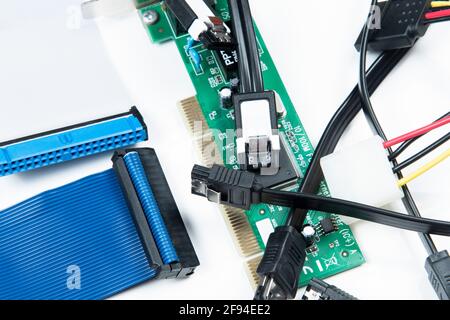 technological waste that remains in residence as computer cables Stock Photo