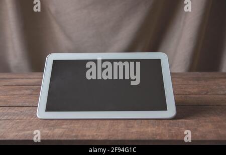 Office workplace with tablet pc on the table.  For a design presentation or portfolio. Stock Photo