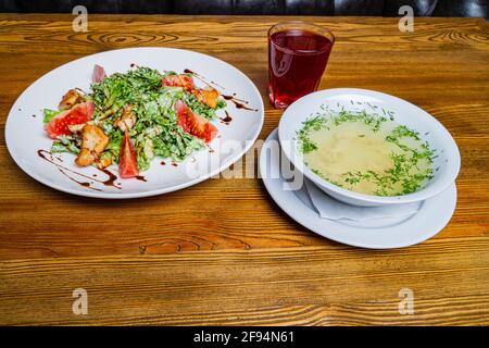 Breakfast including compote, salad, soup Stock Photo