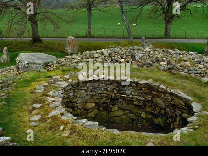 Corrimony Clava-type passage grave, Inverness, Scotland, UK, looking SE across the roughly circular cairn & central burial chamber: passage on R. Stock Photo