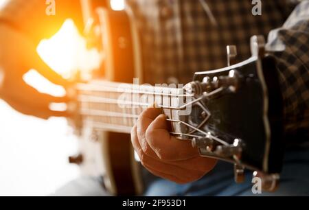Musician playing electric guitar, close up. Stock Photo