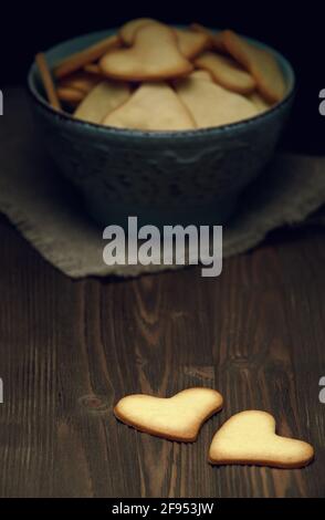 Cookies on wooden background. Heart shaped cookies for valentine's day.. Stock Photo