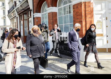 London, UK - 13 Apr 2021: London Mayor Sadiq Khan talks to Cllr Anne Clarke followed by staff during campaigning ahead of elections on 6 May 2021. Stock Photo
