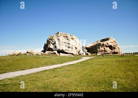 Big Rock Erratic. This massive and unusual rock formation near Okotoks, Alberta, Canada is the world's largest glacial erratic. Stock Photo