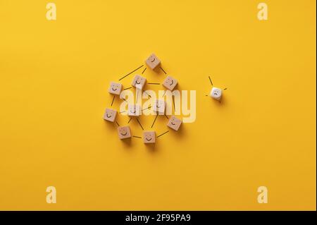 Social isolation and loneliness conceptual image. Over yellow background. Stock Photo
