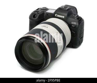 A Canon Eos R5 mirrorless digital camera with a 70mm to 200mm zoom lens. Stock Photo