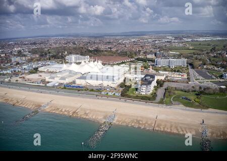 Aerial video of Butlins Holiday Village on the West Sussex coast from the resort of Bognor Regis on a warm and sunny Spring day in England. Stock Photo