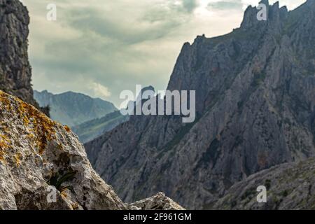 Stone focused with mountain in the background Stock Photo