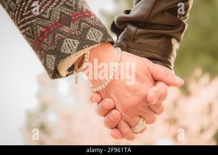 older couple models in love in the sunset Stock Photo