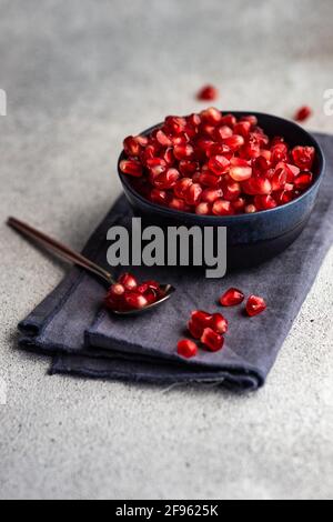 Pomegranate seeds in a bowl Stock Photo