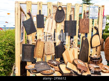 Samara, Russia - June 2, 2018: Different handmade kitchen wood cutting boards Stock Photo