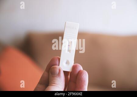 hand holding corona covid-19 rapid antigen self test showing negative result Stock Photo