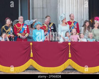 Members of the royal family join HRH The Queen on the balcony of Buckingham Palace to watch the traditional fly past. Prince George and Princess Charlotte seemed particularly excited by the Red Arrows. The Duchess of Cambridge could be seen giving Princess Charlotte a gentle cuddle at one point. The newly married Duke of Sussex and Duchess of Sussex were seen chatting with the Duke's father, Prince Charles.  9 June 2018.  Please byline: Vantagenews.com Stock Photo