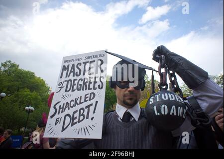 New York, USA. 25th Apr, 2012. Gan Golan, in his 'Master of Degrees costume, joins Occupy Wall Street protesters, students and supporters at a rally in Union Square Park in New York on Wednesday, April 25, 2012, the day that student loan debt is expected to reach $1 trillion. The protest, part of the 1T Day movement, proposes that the government should cover higher education costs, loans, if necessary, to be made at zero interest, colleges open their books and a one-time debt forgiveness. (Photo by Richard B. Levine) Credit: Sipa USA/Alamy Live News Stock Photo