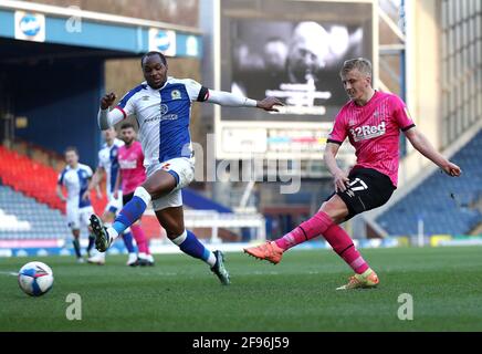 Derby County's Louie Sibley (right) shoots towards goal as Blackburn Rovers' Ryan Nyambe attempts to block it during the Sky Bet Championship match at Ewood Park, Blackburn. Picture date: Friday April 16, 2021. Stock Photo