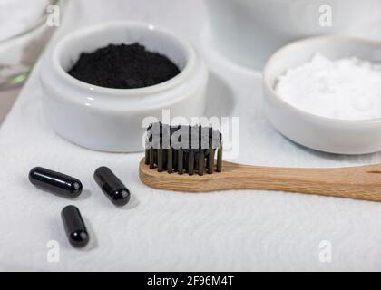 Homemade charcoal powder Toothpaste. Home beauty concept. Close up. Selective focus. Stock Photo