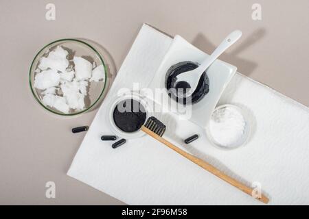 Homemade charcoal powder Toothpaste. Home beauty concept. Close up. Top view. Stock Photo