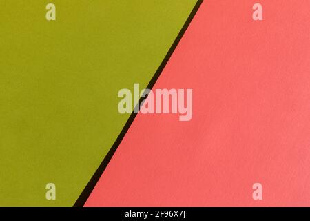 Abstract bright pink and green colored paper texture. Geometric shapes and lines. Minimalist background. Flat lay. Copy space. Stock Photo