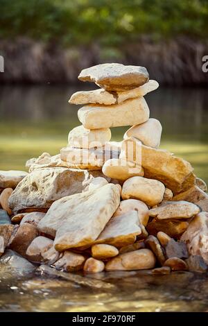 A beacon of hope: The Inukshuk provides a sense of reassurance and safety to those exploring the great outdoors. Stock Photo