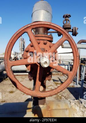 Closing or opening for gas or water supply through a pipeline. Shut-off valves on the pipeline close-up Stock Photo