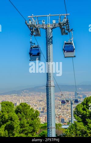 Cable car connecting Barceloneta beach and Montjuic castle in Barcelona ...