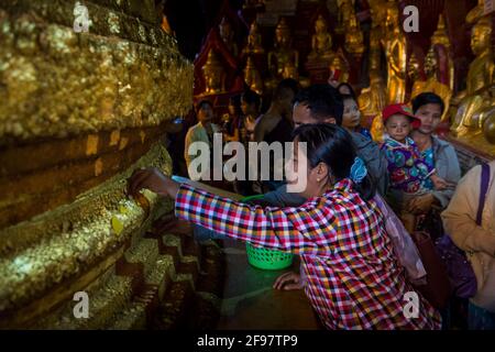 Myanmar, scenes at Inle Lake, the Pindaya Caves with the Shwe U Min Pagoda, believers Stock Photo