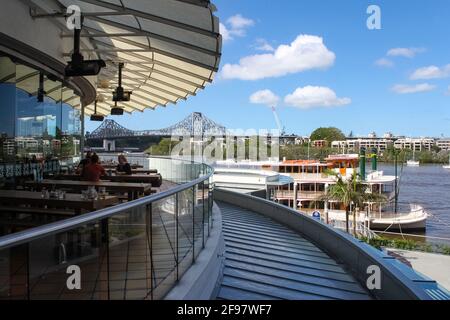 View of Story Bridge and Kookaburra Queen steamboat from deck of Eagle Pier resturants in the CBD of Brisbane Australia 2 25 2015 Stock Photo